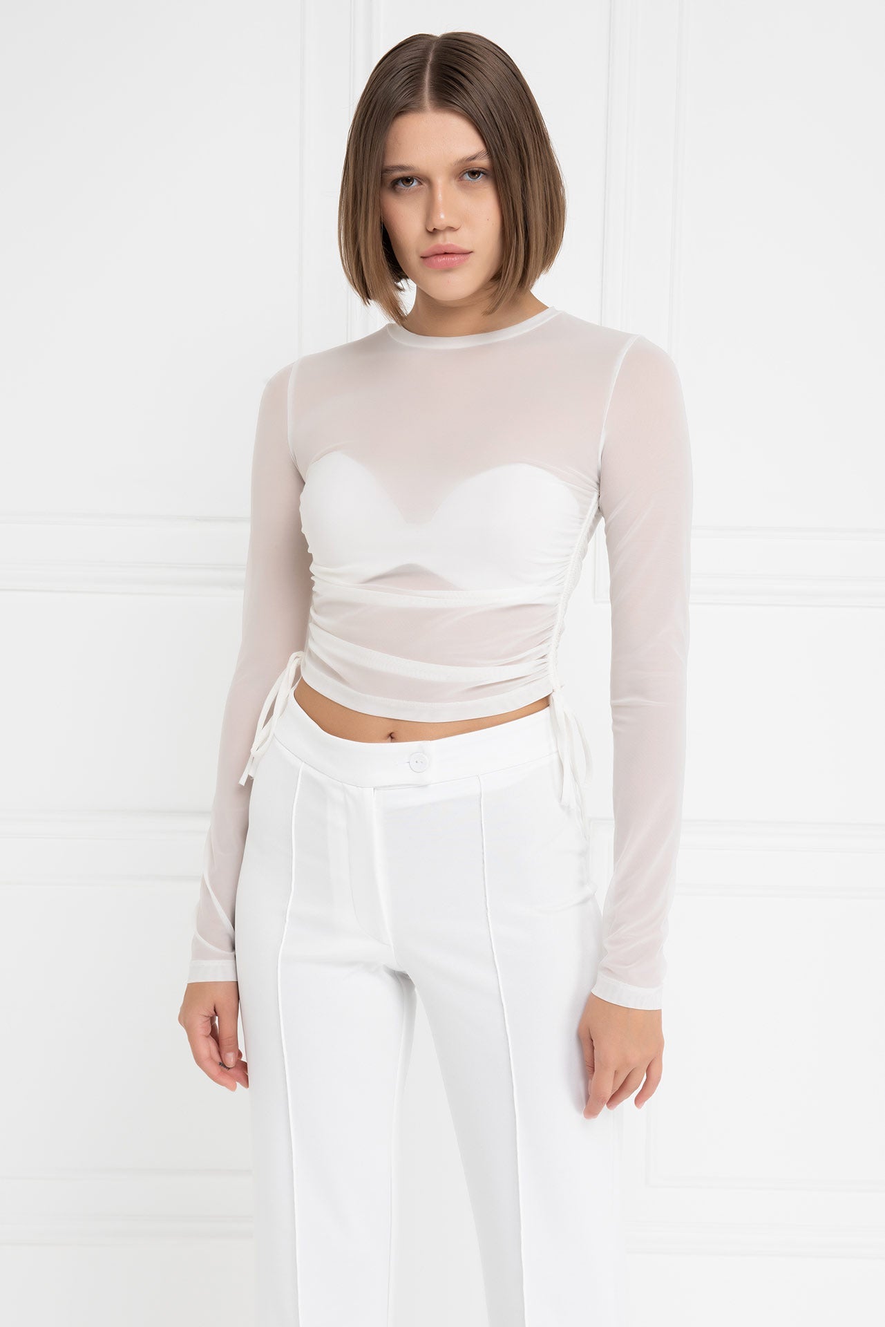 Kikiriki Women's Offwhite Ruched-Side Crop Mesh Top