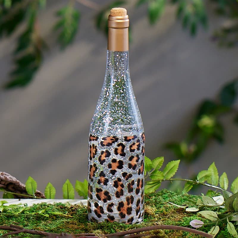 Cracker Barrel Cheetah Print Bottle Glitter Globe